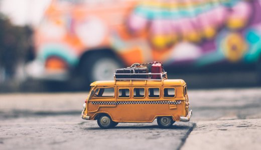 selective focus photography of yellow school bus die cast